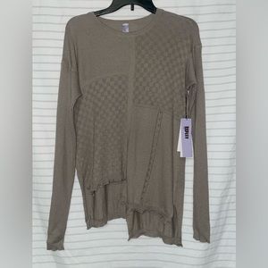 Wilt patched sweater with geometric lining.